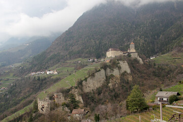 Fototapeta na wymiar Tyrol Castle And The Castle Fountain, Dorf Tirol, South Tyrol, Italy