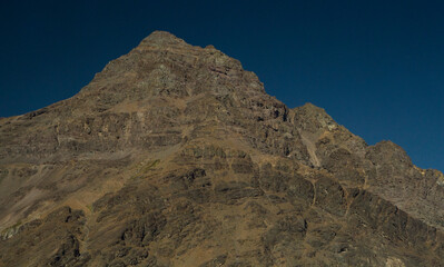 Alpine landscape. View of the rocky Andes mountains in summer. 