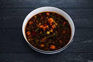 healthy plant-based food, vegan lentil green beans sweet potato stew with spicy tomato sauce