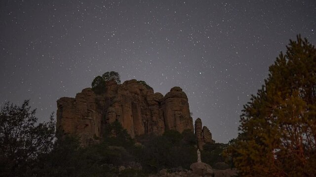 stars over rock mountain time lapse