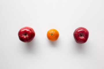 red apples and oranges