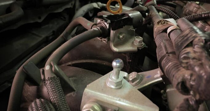Details of a car engine with probe macro lens inside the engine bay
