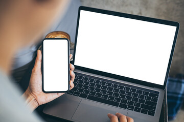 computer screen,cell phone blank mockup.hand woman work using laptop texting mobile.with white background for advertising,contact business search information on desk in cafe.marketing,design