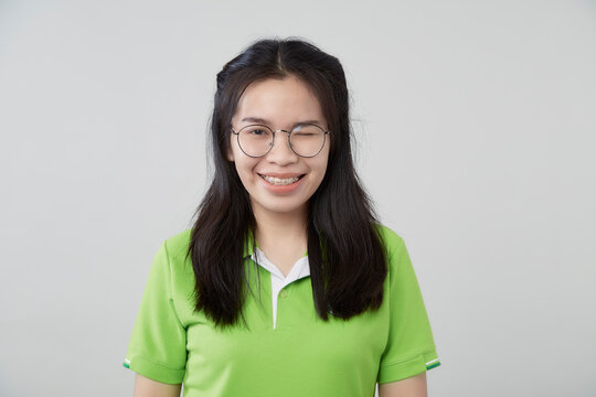 Asian woman portrait with a green shirt