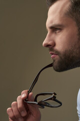 Frowning young person staring into the distance