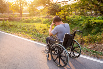 patient or disabled man have anxiety symptoms while sitting and strain on Wheelchair in spring...