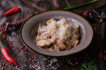 frying pan with meat and vegetables