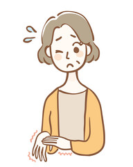 手が痺れている中年女性