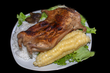 FRIED CUY WITH CHOCLO, LETTUCE AND RICE