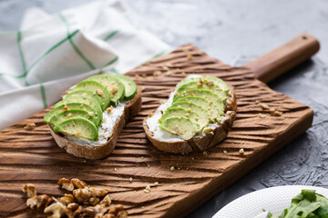 sliced avocado on toast bread with nuts
