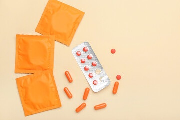 Different contraceptives on color background