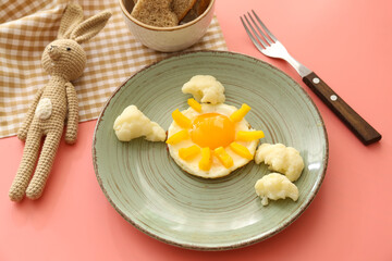 Creative breakfast for children with bread, egg and fresh vegetables on color background