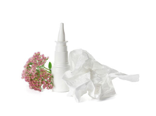 Bottle with drops, flower and used tissue on white background