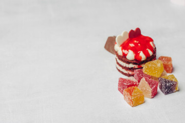 red cake marmalade sweets delight snack wood background