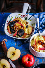 Fried blood sausage with mashed potatoes, apples and fried onions.style rustic