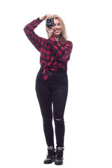 smiling young woman looking through the lens of the camera