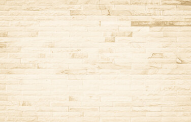 Empty background of wide cream brick wall texture. Beige old brown brick wall concrete or stone textured, wallpaper limestone abstract flooring/Grid uneven interior rock. Home decor design backdrop.