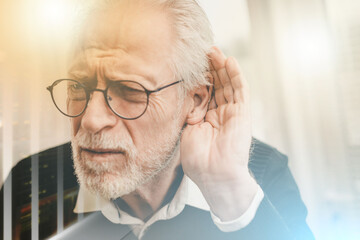 Senior man with hearing problems; multiple exposure