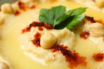 Fresh hummus on whole background, close up