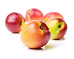  ripe peach on white background