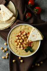 Concept of tasty eat with hummus and pita, top view