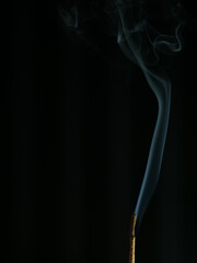 Obraz premium swirling smoke on a black background