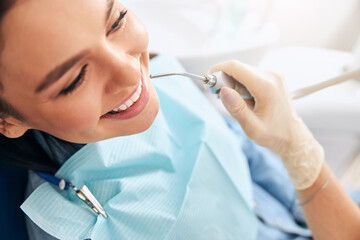 Close up of pleased woman that being at dentistry