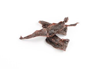 Pet treats on a white background. Dried beef heart.