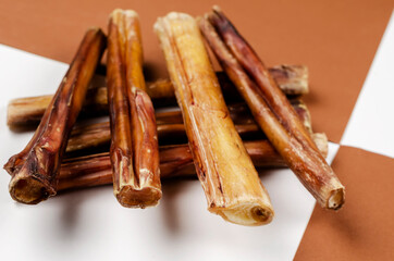 Useful dried chewy treats for pets in close-up.