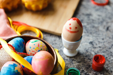 Happy easter. Painting Easter eggs. Happy family preparing for Easter at home