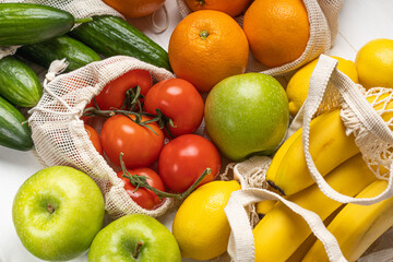 Vegetables and fruits in eco-friendly bags