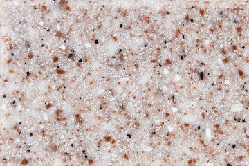 Texture of decorative artificial acrylic stone. Stone sample for bathroom, kitchen countertops furniture. Stone texture for modern interior design.