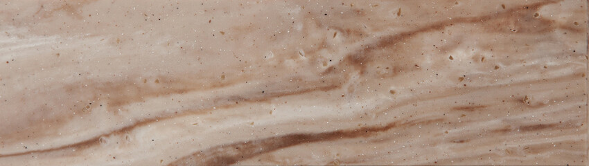 Texture of decorative artificial acrylic stone. Stone sample for bathroom, kitchen countertops furniture. Stone texture for modern interior design.
