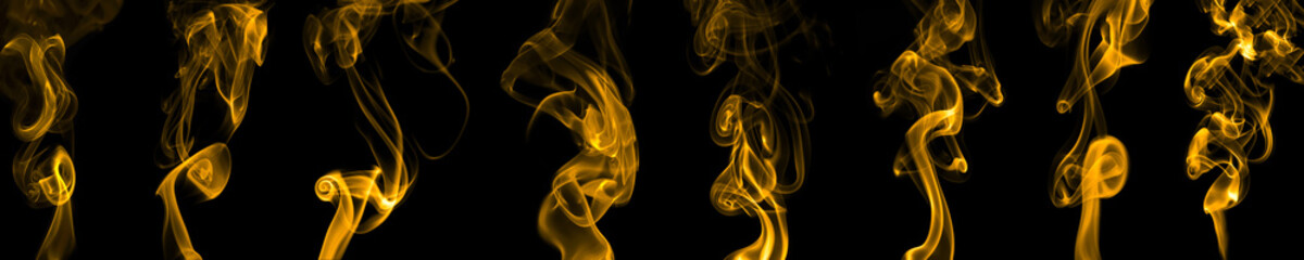 set swirling movement of gold smoke group, abstract line Isolated on black background