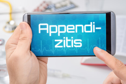 Smartphone mit dem Text Appendizitis auf dem Display