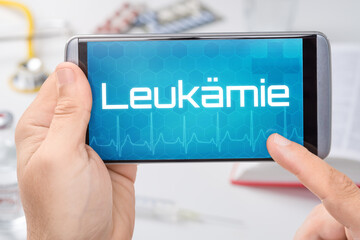 Smartphone mit dem Text Leukämie auf dem Display