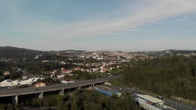 An aerial view on Santiago de Compostella under a bright sky in 4K