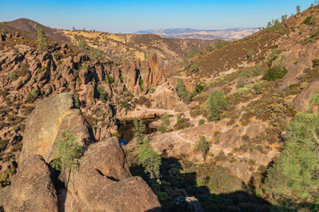 Rock formations in Pinnacles National Park in California, the destroyed remains of an extinct volcano on the San Andreas Fault. Beautiful landscapes, cozy hiking trails for tourists and travelers.