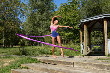 young metis woman training gymnastic rhythmic
