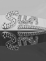 pattern and positive and negative designs based on here come the sun in black on white and white on black