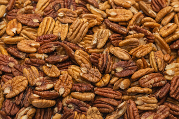 Tasty pecan-nut background. Top view.