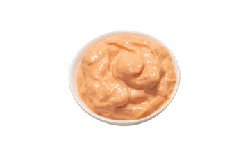 Sauce in a bowl isolated on white.