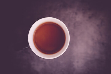 cup of coffee on black background