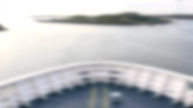 Abstract blurred bow of large ship ferry leaving a river port and heading out to sea - Timelapse