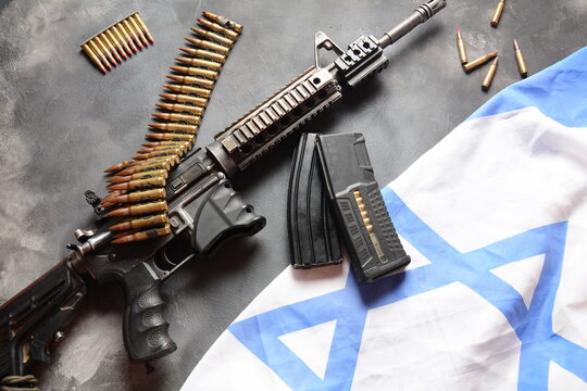 M4 carbine with Israeli flag on the background. Yom Ha'atzmaut Independence Day in Israel concept