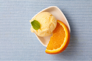 Orange ice cream as an orange sorbet with fresh orange