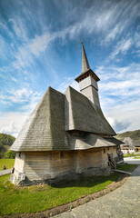 Fototapeta na wymiar Old wooden church at Barsana Monastery in Maramures county, Romania