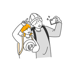 お出かけ先で自撮りをするカップル