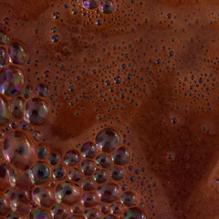 Dark coffee foam top view. Close up of brown foam bubbles. Vector illustration of background or wallpaper. Energetic caffeine symbol.