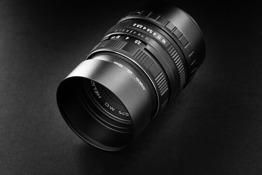 camera lens with a blend on a black background